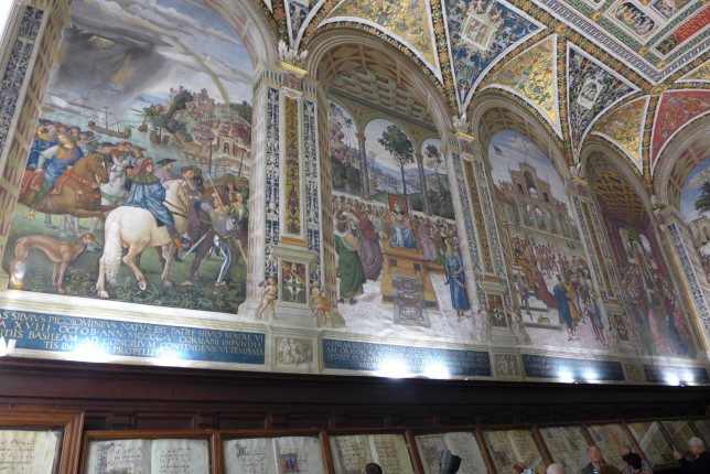 More frescoes with book row below